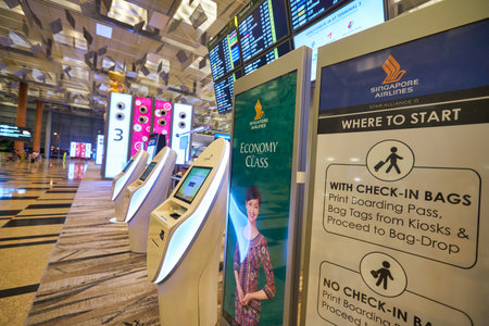 SINGAPORE - CIRCA JANUARY, 2020: Singapore Airlines self-service facilities at Terminal 3, Changi Airport. Changi Airport is a major civilian airport that serves Singapore.のeditorial素材