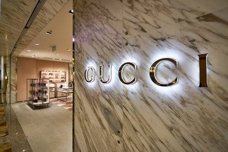 SINGAPORE - CIRCA JANUARY, 2020: close up shot of Gucci sign as seen at a store in Singapore Changi Airport.のeditorial素材
