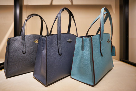 SINGAPORE - CIRCA JANUARY, 2020: bags on display at Coach store in Singapore Changi Airport.のeditorial素材