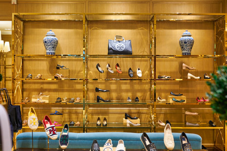 SINGAPORE - CIRCA JANUARY, 2020: bags on display at Tory Burch store in Singapore Changi Airport.のeditorial素材