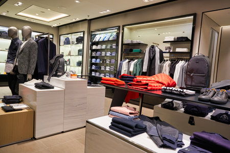 SINGAPORE - CIRCA JANUARY, 2020: clothes on display at Hugo Boss store in Singapore Changi Airport. Hugo Boss AG is a German luxury fashion house headquartered in Metzingen.のeditorial素材