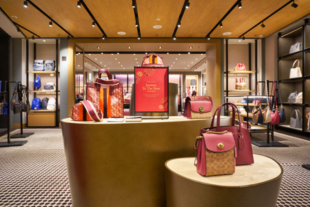 SINGAPORE - CIRCA JANUARY, 2020: bags on display at Coach store in Singapore Changi Airport.のeditorial素材