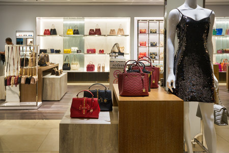 SINGAPORE - CIRCA JANUARY, 2020: bags on display at Michael Kors store in Singapore Changi Airport.のeditorial素材