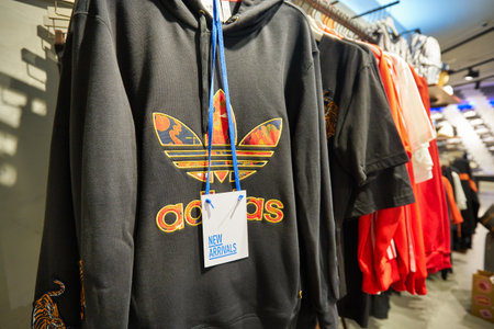 SINGAPORE - CIRCA JANUARY, 2020: clothes on display at Adidas store in Singapore Changi Airport.のeditorial素材