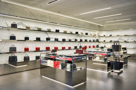 SINGAPORE - CIRCA JANUARY, 2020: bags on display at Yves Saint Laurent store in Singapore Changi Airport.のeditorial素材