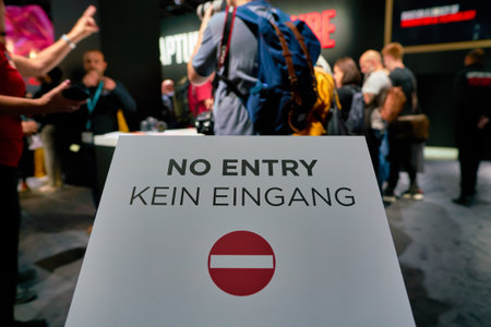 COLOGNE, GERMANY - CIRCA SEPTEMBER, 2018: no entry sign seen at Canon stand at the Photokina Exhibition. Photokina is a leading trade fair for the worldwide photo industry.のeditorial素材