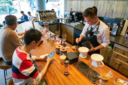 SHENZHEN, CHINA - CIRCA NOVEMBER, 2019: barista prepare coffee at Starbucks Reserve in Shenzhen.