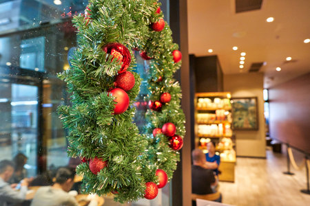 SHENZHEN, CHINA - CIRCA NOVEMBER, 2019: New Year decorations at Starbucks Coffee in Shenzhen.のeditorial素材