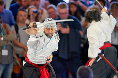 COLOGNE, GERMANY - CIRCA SEPTEMBER, 2018: Samurai Sword Show at Sony stand in Photokina.のeditorial素材