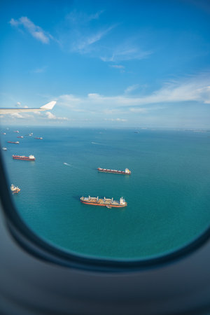 SINGAPORE - CIRCA JANUARY, 2020: aerial view from modern jet aircraft in the daytime.のeditorial素材