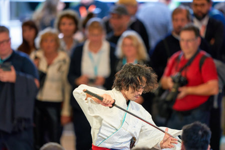 COLOGNE, GERMANY - CIRCA SEPTEMBER, 2018: Samurai Sword Show at Sony stand in Photokina.