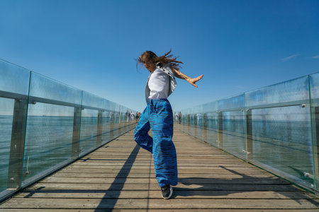 Outdoor photo of young caucasian teenager in Zelenogradsk.の写真素材