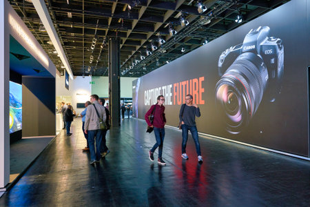 COLOGNE, GERMANY - CIRCA SEPTEMBER, 2018: Canon and Panasonic stands at the Photokina Exhibition. Photokina is a leading trade fair for the worldwide photo industry.のeditorial素材