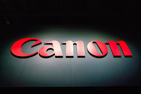 COLOGNE, GERMANY - CIRCA SEPTEMBER, 2018: close up shot of Canon sign at the Photokina Exhibition.のeditorial素材