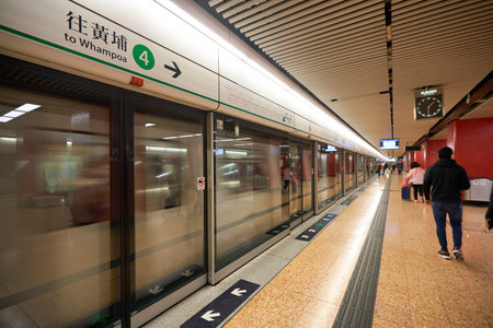HONG KONG - CIRCA DECEMBER, 2019: interior shot of MTR station in Hong Kong. The Mass Transit Railway (MTR) is a major public transport network serving Hong Kong.のeditorial素材