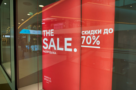 SAINT PETERSBURG, RUSSIA - CIRCA SEPTEMBER, 2022: the sale sign as seen at Marks and Spencer store in Galeria Shopping Mall.のeditorial素材