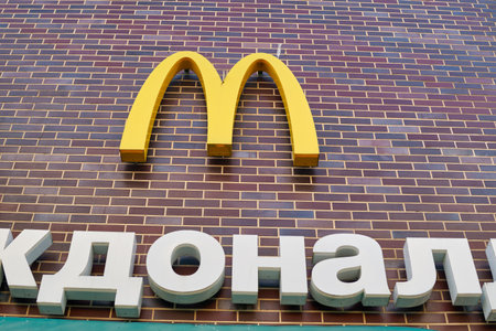 KALININGRAD, RUSSIA - CIRCA JULY, 2022: the Golden Arches sign as seen at McDonald's restaurant, closed after sanctions were imposed.のeditorial素材