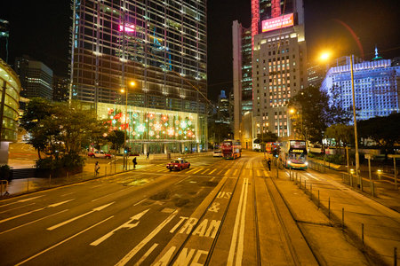 HONG KONG - CIRCA DECEMBER, 2019: view from upper deck of double-decker tramway. The tram is the...