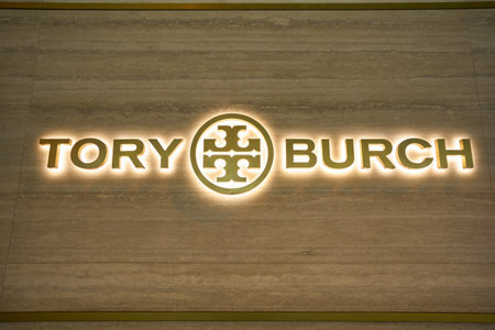 HONG KONG - CIRCA DECEMBER, 2019: close up shot of Tory Burch sign as seen in Hong Kong at night.