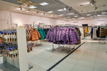SAINT PETERSBURG, RUSSIA - CIRCA SEPTEMBER, 2022: clothes on display in Stockmann at Nevsky Centre...