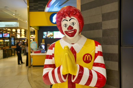 BANGKOK, THAILAND - CIRCA JANUARY, 2020: life size Ronald McDonald statue greeting customers with...
