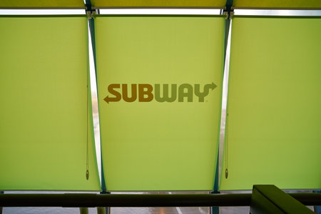 MOSCOW, RUSSIA - CIRCA SEPTEMBER, 2018: subway sign as seen on green window shade.のeditorial素材