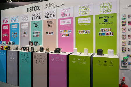 COLOGNE, GERMANY - CIRCA SEPTEMBER, 2018: Instax cameras on display at Photokina Exhibition. Photokina is a trade fair held in Europe for the photographic and imaging industries.のeditorial素材