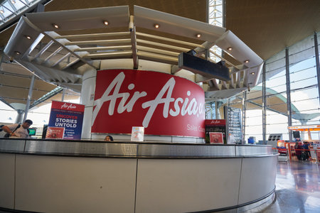 KUALA LUMPUR, MALAYSIA - CIRCA JANUARY, 2020: AirAsia sales counter at Kuala Lumpur International Airport.のeditorial素材