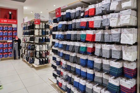 SHENZHEN, CHINA - CIRCA NOVEMBER, 2019: interior shot of Uniqlo store in Shenzhen. Uniqlo is a Japanese casual wear designer, manufacturer and retailer.のeditorial素材