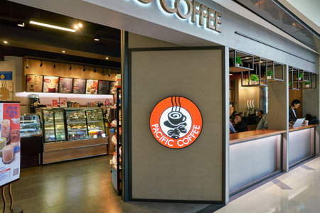 SHENZHEN, CHINA - CIRCA NOVEMBER, 2019: entrance to Pacific Coffee at shopping mall in Shenzhen. Pacific Coffee is a coffee house chain from Hong Kong.のeditorial素材