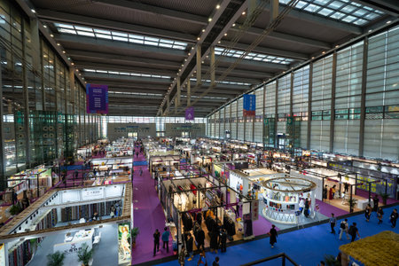 SHENZHEN, CHINA - 27 NOVEMBER, 2019: top view of exhibition stands and people at Fashion Source space in Shenzhen Convention & Exhibition Center.のeditorial素材