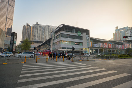 SHENZHEN, CHINA - 27 NOVEMBER, 2019: street level view of COCO Park in Futian Districtのeditorial素材