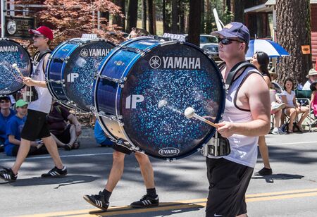Graeagle, California, USA- July 5, 2015: Drummers from the eNVision Performing Arts group thrill the crowd at the Mohawk Valley Independence Day Celebration parade in this small northern California town.のeditorial素材
