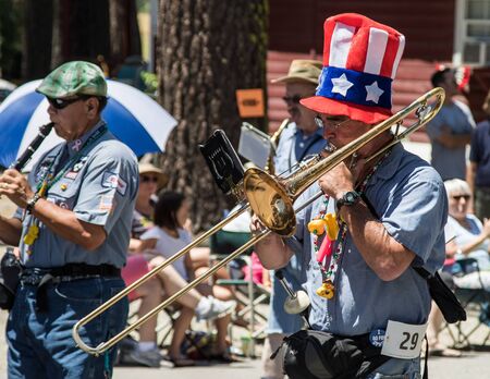 Graeagle, California, USA- July 5, 2015: The Ophir Prison Marching and Kazoo Band performing while marching in the Mohawk Valley Independence Day Celebration in this small northern California town.のeditorial素材