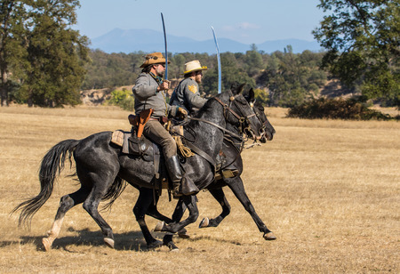 Confederate Scouts attack, Civil War reenactment, Anderson, California.のeditorial素材