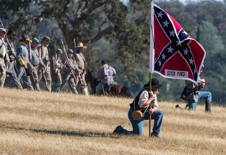 Confederates advance , Civil War Reenactment at Anderson, California.のeditorial素材