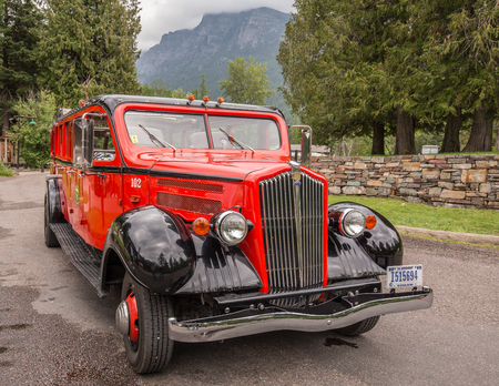 Glacier National Park, Montana, USA-July 11, 2015: The famous Red Bus vehicles of the parks service...