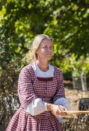 Woman in Period Costume, Civil War Reenactment at Anderson, California.のeditorial素材