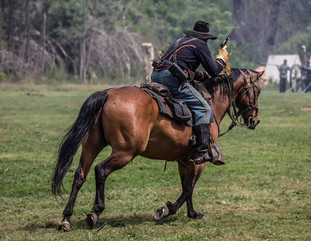 Union scout picks targets at a Civil War Reenactment, Red Bluff, Californiaのeditorial素材