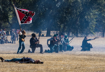 Confederates in combat at the Hawes Farm Reenactment in Anderson, California.のeditorial素材