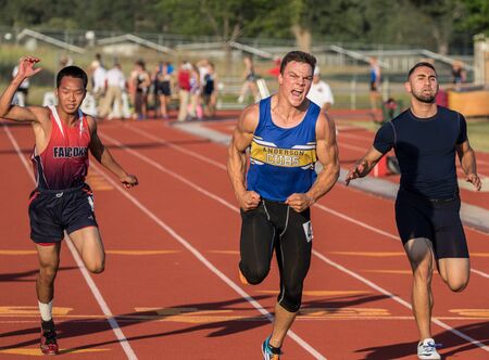 Championship track meet action in Cottonwood, California.のeditorial素材