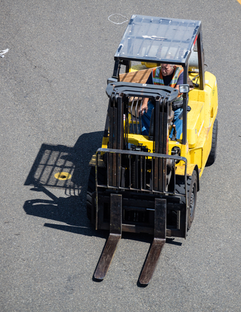 Forklift loading supplies on a cruise ship in Seattle.
