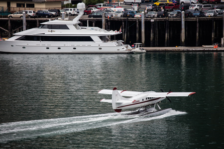 Seaplane landing in the harbor in Juneau, Alaska.のeditorial素材