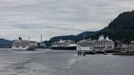 Fishing boats and cruise ships  in Juneau, Alaska.のeditorial素材