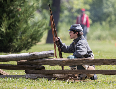 American Civil War reenactors in action at the Dog Island event in Red Bluff, California.のeditorial素材
