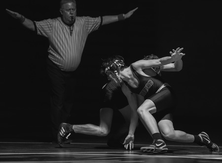 Wrestling action with Pleasant Valley vs. Foothill High School in Paolo Cedro, California.のeditorial素材