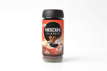 Klang,Malaysia:February 11, 2021-Bottle of Nescafe Classic over white background. Nescafe is a brand of coffee made by Nestle.のeditorial素材