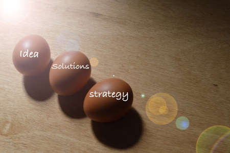 Eggs written with text IDEA, SOLUTIONS and STRATEGY.