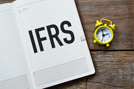 Notebook written with text IFRS stands for International Financial Reporting Standardsの写真素材