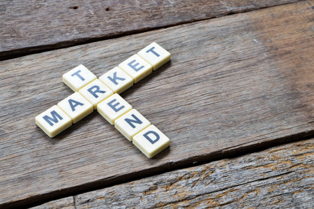 Top angle view of square letters with text TREND and MARKET.の写真素材